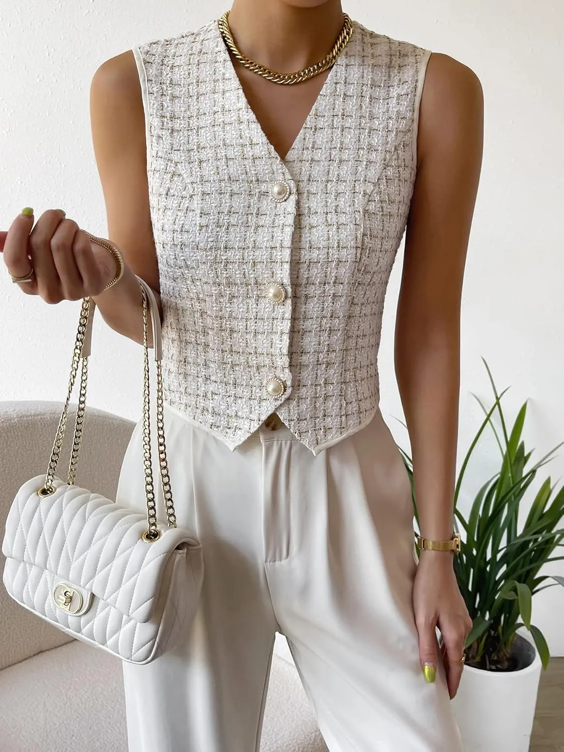 WDIRARA Women's Asymmetrical Hem Button Front Crop Blazer Sleeveless V Neck Blazer Vest